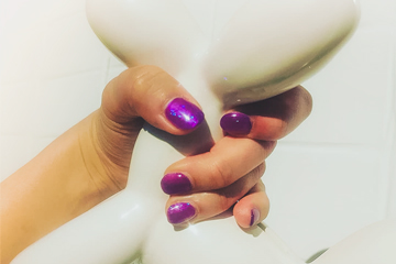 Gel manicure purple